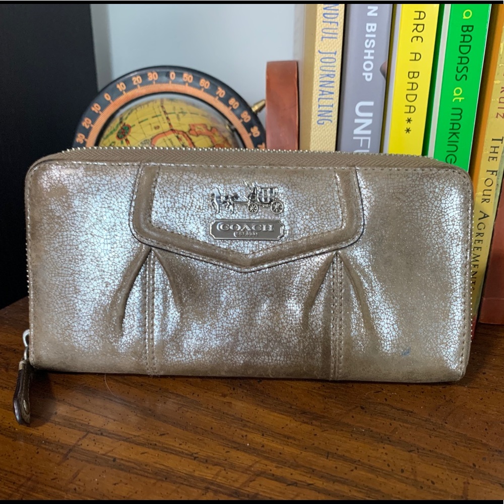 Well loved Coach accordion zip wallet